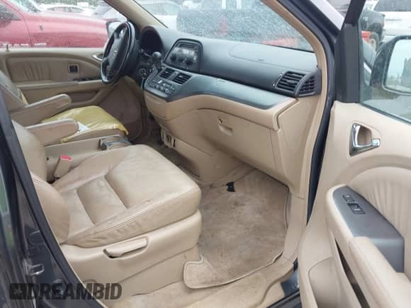 2005 Honda Odyssey Touring with VIN 5FNRL38895B006074, listed as a IAAI auction lot 43542344 with 240,192 mi miles and . Bid and sale history available at DreamBid. Image 5.