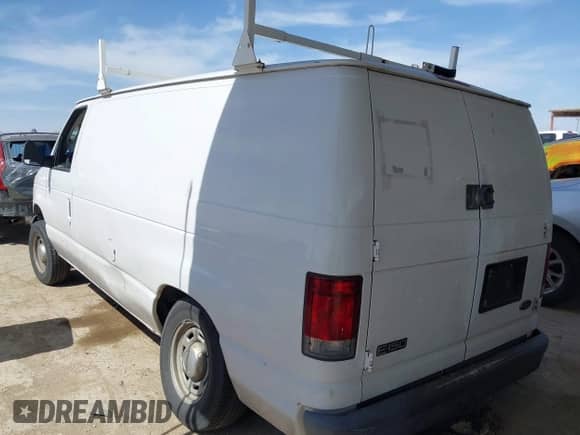 2004 Ford Econoline Cargo with VIN 1FTRE14W44HA29084, listed as a IAAI auction lot 41793350 with 123,429 mi miles and . Bid and sale history available at DreamBid. Image 3.