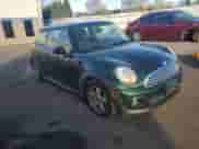 2011 MINI Hardtop with VIN WMWSU3C59BT253726, listed as a Copart auction lot 87220845 with 123,389 mi miles and Salvage title. Bid and sale history available at DreamBid. Image 4.