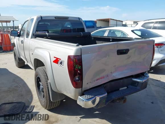 2005 Chevrolet Colorado LS Z71 with VIN 1GCDT196858151747, listed as a IAAI auction lot 42892036 with 153,075 mi miles and . Bid and sale history available at DreamBid. Image 3.