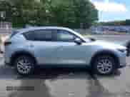 2023 Mazda CX-5 S Select with VIN JM3KFBBM6P0208887, listed as a IAAI auction lot 43113803 with 26,288 mi miles and . Bid and sale history available at DreamBid. Image 13.