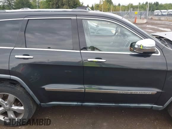 2011 Jeep Grand Cherokee Overland z VIN 1J4RR6GG5BC737094, wystawiony jako IAAI lot #43115697 z przebiegiem 184 207 mil mil oraz . Historia ofert i sprzedaży dostępna na DreamBid. Obrazek 13.