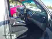 2015 Toyota Tacoma with VIN 3TMLU4EN1FM197831, listed as a IAAI auction lot 43233901 with 123,905 mi miles and . Bid and sale history available at DreamBid. Image 5.