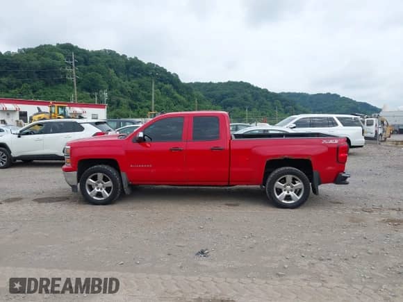 2014 Chevrolet Silverado 1500 LT with VIN 1GCVKREC4EZ116490, listed as a IAAI auction lot 42600404 with 199,461 mi miles and . Bid and sale history available at DreamBid. Image 14.