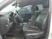 2018 Chevrolet Traverse Premier z VIN 1GNERKKW8JJ104361, wystawiony jako Copart lot #71651405 z przebiegiem 154 557 mil mil oraz Czysty tytuł • Clean title. Historia ofert i sprzedaży dostępna na DreamBid. Obrazek 7.