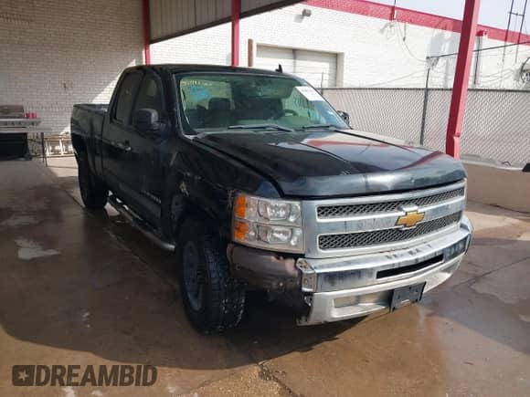 2013 Chevrolet Silverado 1500 LS with VIN 1GCRCREAXDZ412108, listed as a IAAI auction lot 43402410 with 180,302 mi miles and . Bid and sale history available at DreamBid. Image 1.