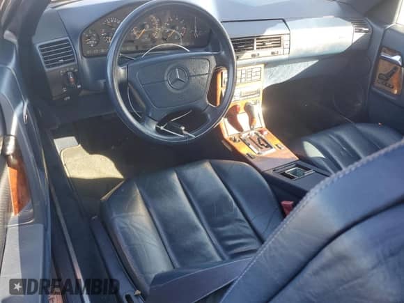 1992 Mercedes-Benz SL с VIN WDBFA66E7NF049065, выставлен на аукционе Copart как лот 82144064 с пробегом 90 848 миль миль и Чистый • Clean title. История ставок и продаж доступна на DreamBid. Изображение 8.