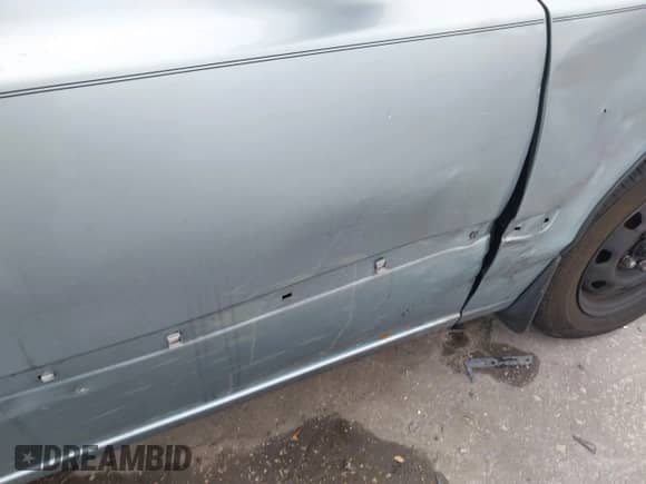 2003 Hyundai Accent GL z VIN KMHCG45C93U496234, wystawiony jako IAAI lot #38787449 z przebiegiem 191 590 mil mil oraz . Historia ofert i sprzedaży dostępna na DreamBid. Obrazek 16.