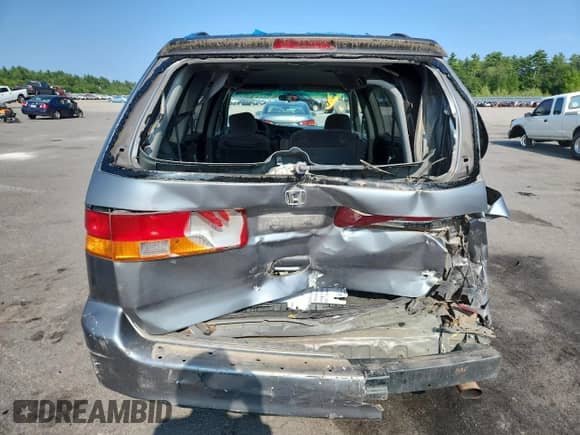 2002 Honda Odyssey LX with VIN 2HKRL18532H504584, listed as a Copart auction lot 67735975 with 230,708 mi miles and Salvage title. Bid and sale history available at DreamBid. Image 6.