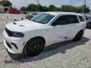 2021 Dodge Durango SRT Hellcat с VIN 1C4SDJH99MC758610, выставлен на аукционе Copart как лот 64888415 с пробегом 30 141 миль миль и Списание • Salvage title. История ставок и продаж доступна на DreamBid. Изображение 1.