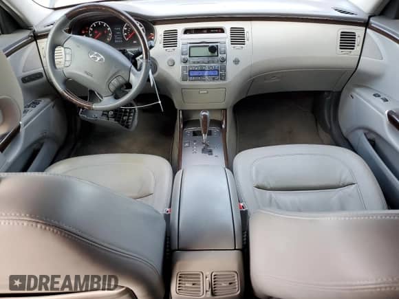 2011 Hyundai Azera Limited с VIN KMHFC4DF5BA559432, выставлен на аукционе Copart как лот 41650425 с пробегом 187 025 миль миль и Списание • Salvage title. История ставок и продаж доступна на DreamBid. Изображение 8.