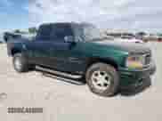 2002 GMC Sierra 1500 Denali z VIN 2GTFK69U021329107, wystawiony jako Copart lot #65479695 z przebiegiem 224 881 mil mil oraz Czysty tytuł • Clean title. Historia ofert i sprzedaży dostępna na DreamBid. Obrazek 4.