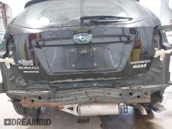 2014 Subaru Impreza Premium with VIN JF1GPAD64E8288800, listed as a IAAI auction lot 43174669 with 160,222 mi miles and . Bid and sale history available at DreamBid. Image 6.
