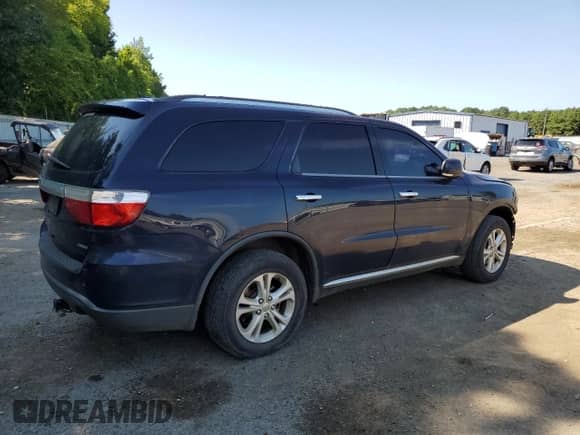 2013 Dodge Durango Crew with VIN 1C4RDHDG3DC680546, listed as a Copart auction lot 68221125 with 286,321 mi miles and Salvage title. Bid and sale history available at DreamBid. Image 3.