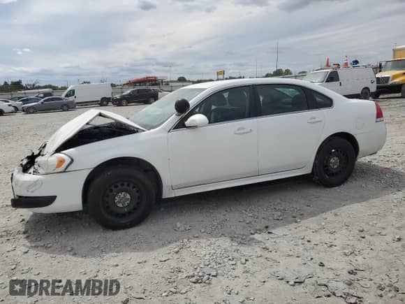 2012 Chevrolet Impala Police Police with VIN 2G1WD5E32C1233829, listed as a Copart auction lot 70190245 with Not provided miles and Salvage title. Bid and sale history available at DreamBid. Image 1.