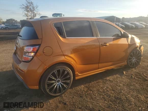 2017 Chevrolet Sonic Premier with VIN 1G1JF6SB2H4116771, listed as a Copart auction lot 79769044 with 84,433 mi miles and Salvage title. Bid and sale history available at DreamBid. Image 3.