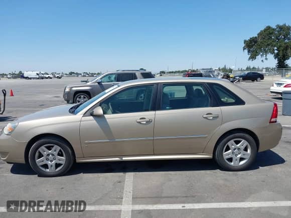 2006 Chevrolet Malibu Maxx LT z VIN 1G1ZT63806F263297, wystawiony jako IAAI lot #42606398 z przebiegiem 97 892 mil mil oraz . Historia ofert i sprzedaży dostępna na DreamBid. Obrazek 14.