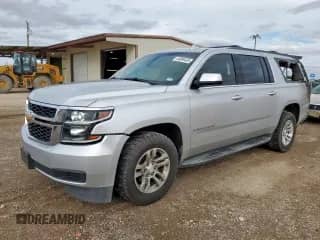 2017 Chevrolet Suburban LS with VIN 1GNSCGEC7HR289663, listed as a Copart auction lot 84000435 with 173,709 mi miles and Salvage title. Bid and sale history available at DreamBid. Image 1.