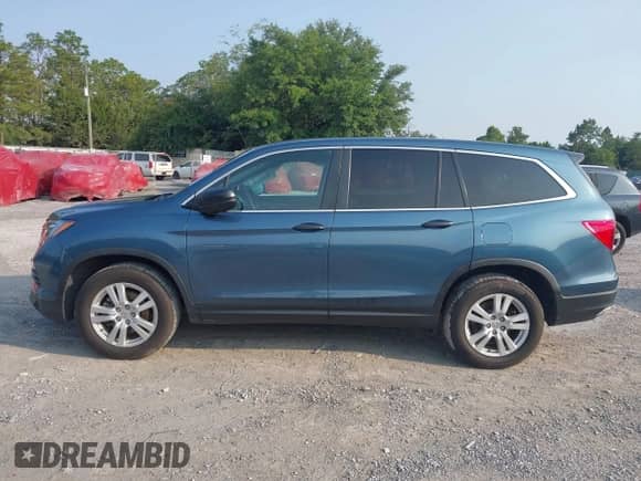 2016 Honda Pilot LX z VIN 5FNYF6H17GB092852, wystawiony jako IAAI lot #42406550 z przebiegiem 141 165 mil mil oraz . Historia ofert i sprzedaży dostępna na DreamBid. Obrazek 14.
