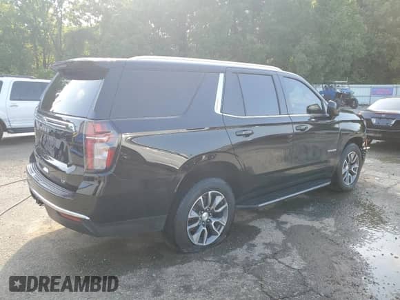 2022 Chevrolet Tahoe LT with VIN 1GNSCNKD7NR148542, listed as a Copart auction lot 64769285 with 74,552 mi miles and Salvage title. Bid and sale history available at DreamBid. Image 3.