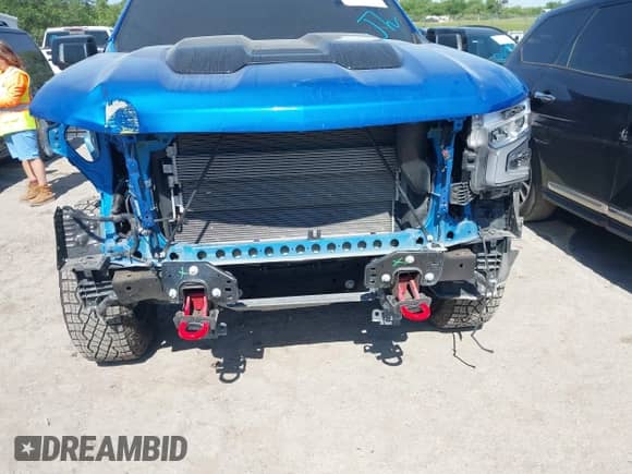 2024 Chevrolet Silverado 1500 LT Trail Boss z VIN 3GCUDFED4RG208525, wystawiony jako IAAI lot #42239130 z przebiegiem 22 472 mil mil oraz . Historia ofert i sprzedaży dostępna na DreamBid. Obrazek 6.