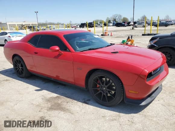 2012 Dodge Challenger SRT-8 392 с VIN 2C3CDYCJ2CH103820, выставлен на аукционе Copart как лот 54277195 с пробегом 61 260 миль миль и Списание • Salvage title. История ставок и продаж доступна на DreamBid. Изображение 4.