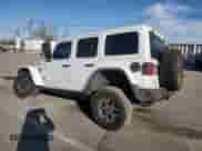 2023 Jeep Wrangler Rubicon Farout z VIN 1C4JJXFM2PW588219, wystawiony jako Copart lot #77599774 z przebiegiem 38 914 mil mil oraz Szkoda całkowita • Salvage title. Historia ofert i sprzedaży dostępna na DreamBid. Obrazek 2.