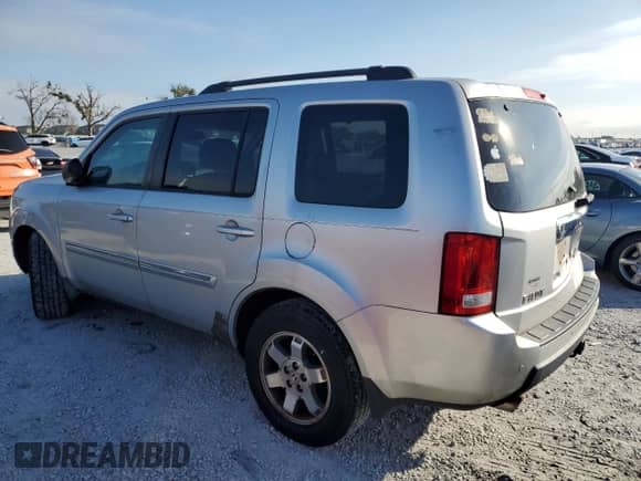 2010 Honda Pilot Touring с VIN 5FNYF4H87AB003161, выставлен на аукционе Copart как лот 89436975 с пробегом 160 834 миль миль и Чистый • Clean title. История ставок и продаж доступна на DreamBid. Изображение 2.