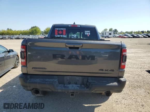 2020 Ram 1500 Rebel z VIN 1C6SRFLT0LN233317, wystawiony jako Copart lot #70363135 z przebiegiem 124 850 mil mil oraz Szkoda całkowita • Salvage title. Historia ofert i sprzedaży dostępna na DreamBid. Obrazek 6.