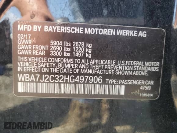 2017 BMW 7 Series 740e xDrive with VIN WBA7J2C32HG497906, listed as a Copart auction lot 68861214 with Not provided miles and Salvage title. Bid and sale history available at DreamBid. Image 14.