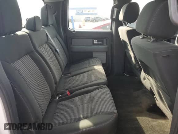 2014 Ford F-150 STX с VIN 1FTFW1EF4EKF61597, выставлен на аукционе Copart как лот 71157895 с пробегом 203 934 миль миль и Списание • Salvage title. История ставок и продаж доступна на DreamBid. Изображение 10.