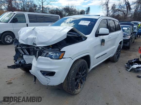 2022 Jeep Grand Cherokee Laredo X with VIN 1C4RJFAG8NC114210, listed as a IAAI auction lot 41780584 with 35,834 mi miles and . Bid and sale history available at DreamBid. Image 2.