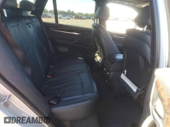 2017 BMW X5 xDrive35i с VIN 5UXKR0C53H0V49627, выставлен на аукционе Copart как лот 82297225 с пробегом 98 938 миль миль и Списание • Salvage title. История ставок и продаж доступна на DreamBid. Изображение 11.