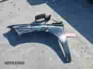 2014 Ram 1500 Express z VIN 3C6JR6AT5EG305140, wystawiony jako IAAI lot #42444478 z przebiegiem 140 072 mil mil oraz . Historia ofert i sprzedaży dostępna na DreamBid. Obrazek 21.