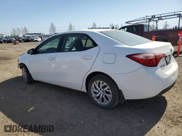 2019 Toyota Corolla XLE z VIN 2T1BURHE9KC243817, wystawiony jako Copart lot #55578415 z przebiegiem 232 710 mil mil oraz Szkoda całkowita • Salvage title. Historia ofert i sprzedaży dostępna na DreamBid. Obrazek 2.