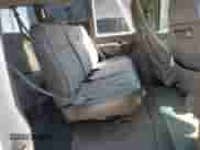 2004 Chevrolet Express Passenger z VIN 1GAHG39U441219042, wystawiony jako Copart lot #67287465 z przebiegiem 257 948 mil mil oraz Szkoda całkowita • Salvage title. Historia ofert i sprzedaży dostępna na DreamBid. Obrazek 11.