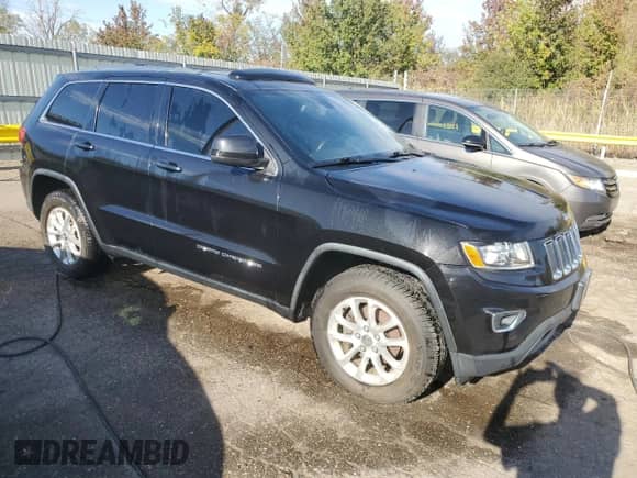 2014 Jeep Grand Cherokee Laredo with VIN 1C4RJEAG9EC145007, listed as a Copart auction lot 86271595 with 185,490 mi miles and Clean title. Bid and sale history available at DreamBid. Image 4.