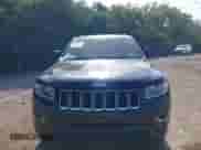 2014 Jeep Grand Cherokee Laredo z VIN 1C4RJFAGXEC255361, wystawiony jako IAAI lot #43383183 z przebiegiem 227 059 mil mil oraz . Historia ofert i sprzedaży dostępna na DreamBid. Obrazek 13.