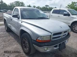 2002 Dodge Dakota with VIN 1B7FL36NX2S522194, listed as a IAAI auction lot 42366140 with 232,464 mi miles and . Bid and sale history available at DreamBid. Image 1.