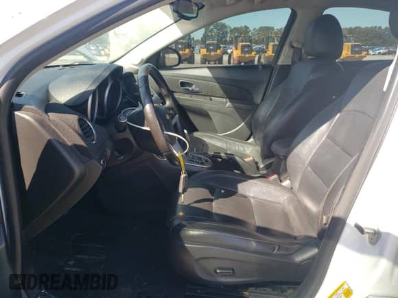 2015 Chevrolet Cruze LT with VIN 1G1PE5SB9F7250650, listed as a Copart auction lot 82333875 with 138,492 mi miles and Salvage title. Bid and sale history available at DreamBid. Image 7.