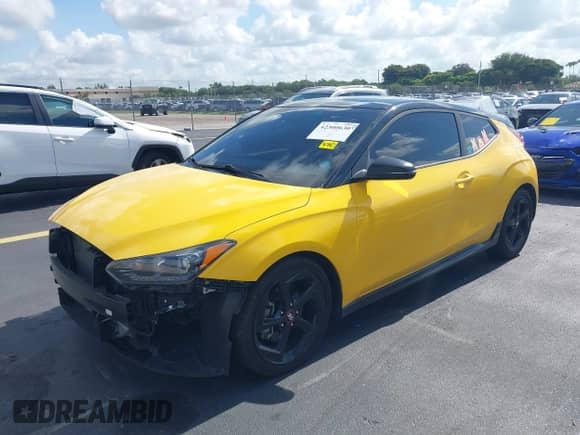 2019 Hyundai Veloster Turbo R-Spec z VIN KMHTH6AB8KU005978, wystawiony jako IAAI lot #42300630 z przebiegiem 55 273 mil mil oraz . Historia ofert i sprzedaży dostępna na DreamBid. Obrazek 2.