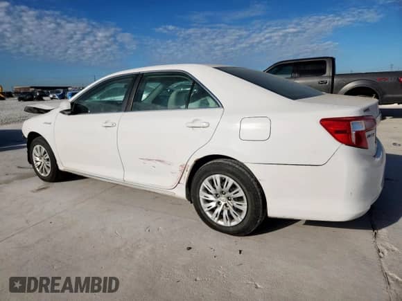 2012 Toyota Camry XLE with VIN 4T1BD1FK4CU016013, listed as a Copart auction lot 85202975 with 122,744 mi miles and Salvage title. Bid and sale history available at DreamBid. Image 2.