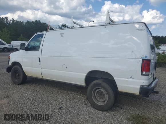 2014 Ford Econoline Cargo Commercial with VIN 1FTNE2EWXEDA07635, listed as a Copart auction lot 61407115 with 205,068 mi miles and Salvage title. Bid and sale history available at DreamBid. Image 2.