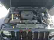 2021 Jeep Wrangler Willys z VIN 1C4GJXANXMW713182, wystawiony jako Copart lot #69206424 z przebiegiem 38 985 mil mil oraz Szkoda całkowita • Salvage title. Historia ofert i sprzedaży dostępna na DreamBid. Obrazek 13.