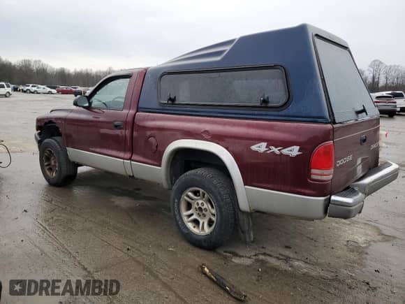 2003 Dodge Dakota с VIN 1D7GG46X33S363431, выставлен на аукционе Copart как лот 79881084 с пробегом 177 109 миль миль и Списание • Salvage title. История ставок и продаж доступна на DreamBid. Изображение 2.