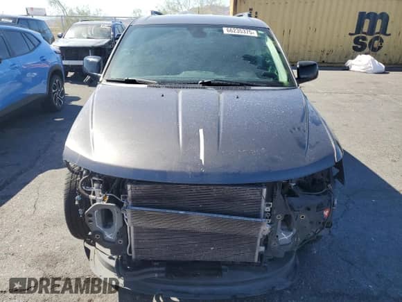 2018 Dodge Journey GT with VIN 3C4PDCEG1JT243928, listed as a Copart auction lot 66235375 with 148,630 mi miles and Salvage title. Bid and sale history available at DreamBid. Image 5.