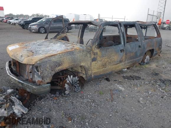 1995 Chevrolet Suburban with VIN 1GNFK16K8SJ359670, listed as a IAAI auction lot 42710115 with Not provided miles and . Bid and sale history available at DreamBid. Image 2.