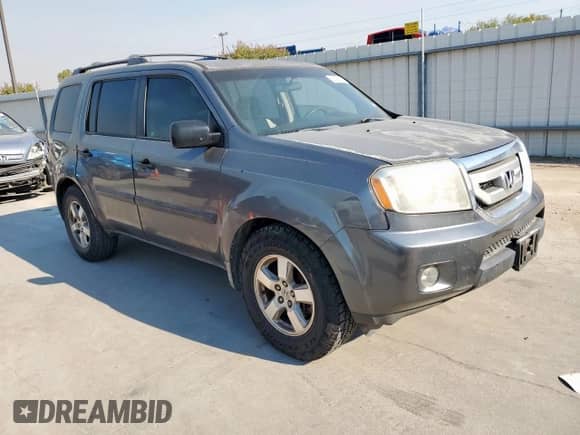 2011 Honda Pilot LX с VIN 5FNYF3H22BB025642, выставлен на аукционе Copart как лот 86422505 с пробегом 218 286 миль миль и Списание • Salvage title. История ставок и продаж доступна на DreamBid. Изображение 4.