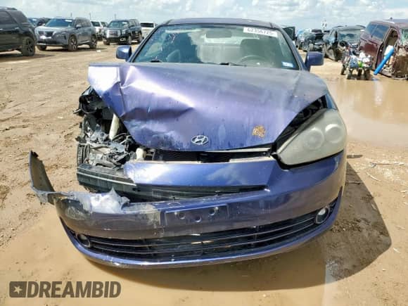 2007 Hyundai Tiburon GS с VIN KMHHM66D87U256521, выставлен на аукционе Copart как лот 62356725 с пробегом 80 920 миль миль и Чистый • Clean title. История ставок и продаж доступна на DreamBid. Изображение 5.