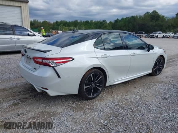 2020 Toyota Camry XSE z VIN 4T1K61AK6LU367572, wystawiony jako IAAI lot #43415552 z przebiegiem 99 436 mil mil oraz . Historia ofert i sprzedaży dostępna na DreamBid. Obrazek 4.